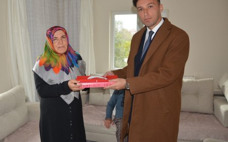 KORKUTELİ Cumhuriyet Başsavcısı Ozan Kapıcı, Şehit Ahmet Belen'in ailesini ziyaret etti.