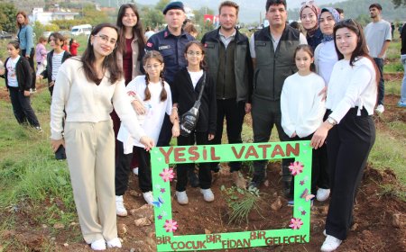 Kumluca'da 'Bir Çocuk, Bir Fidan, Bir Gelecek' Sloganıyla 300 Harnup Fidanı Toprakla Buluştu